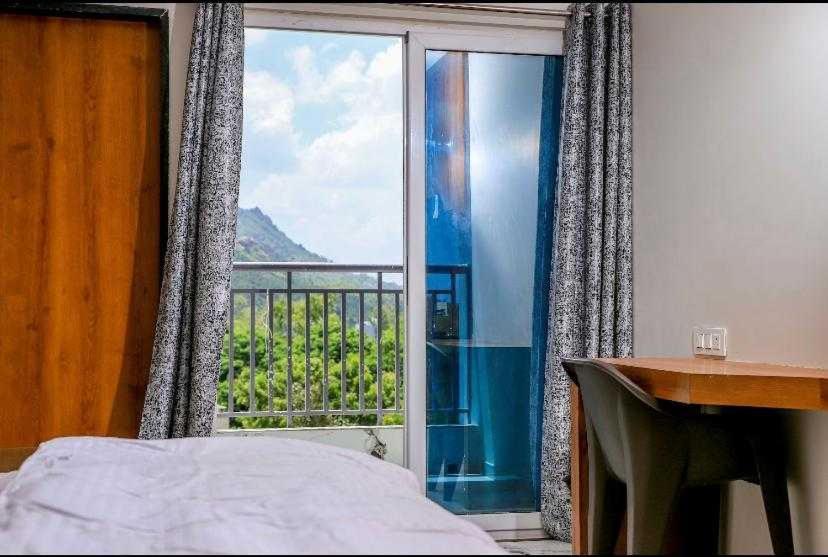 Super Townhouse Ambaji Formerly Hotel Kardhar Inn Kültér fotó